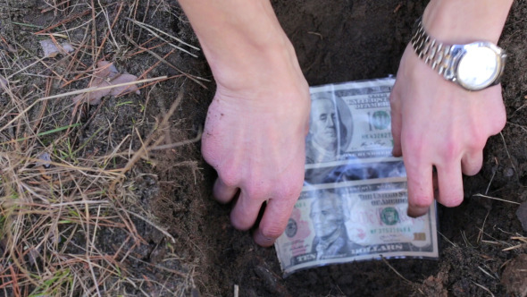 Man Hides Dollars in Cache