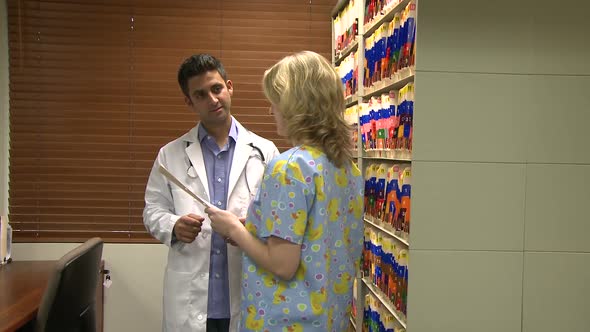 Doctor And Nurse In Filing Room (1 Of 7)