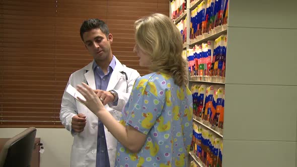 Doctor And Nurse In Filing Room (3 Of 7)