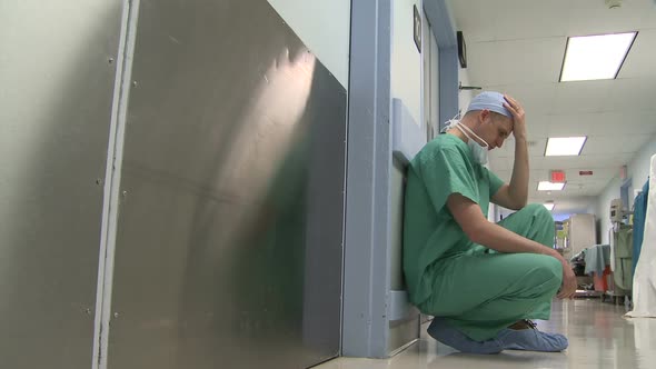 Worried Family Member Waits Outside Operating Room