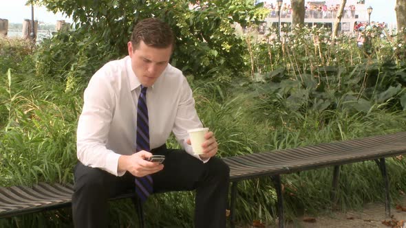 Businessman Sits On Bench Talking On Phone (3 Of 3)