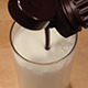 Mixing Chocolate Syrup Into Milk - VideoHive Item for Sale
