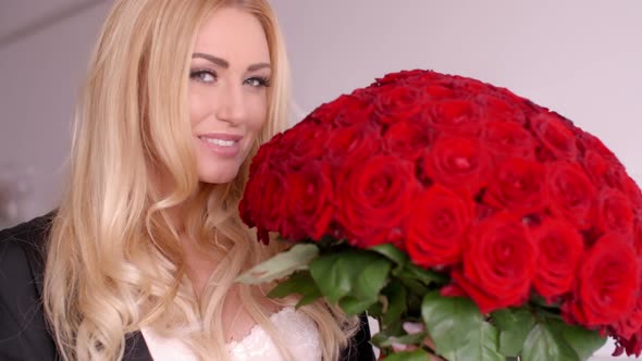 Happy Woman With Fresh Red Rose Flower Bouquet 1 alt