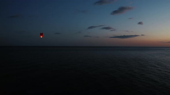 Chinese Lantern Flying In The Sky at Sunset Light