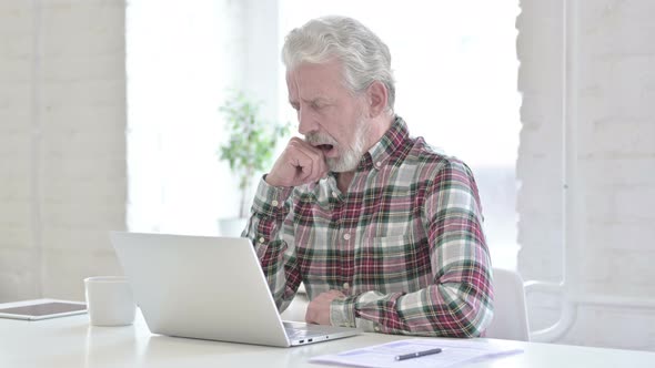 Tired Casual Old Man Taking Nap in Office 