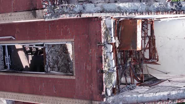 Vertical Video of the Consequences of the War in Ukraine  a Destroyed Residential Building