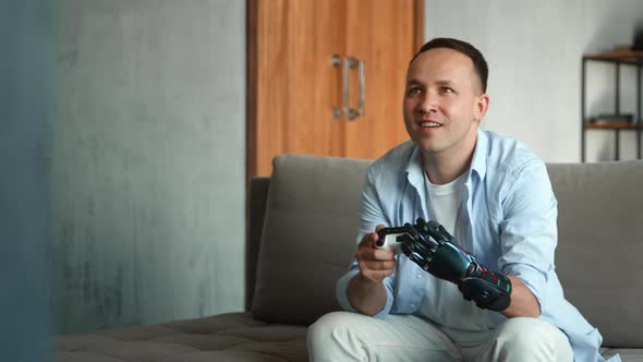 Professional console game player with artificial hand prothesis