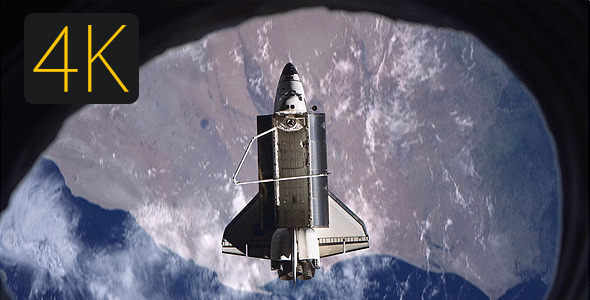 Shuttle Flying Over The Earth