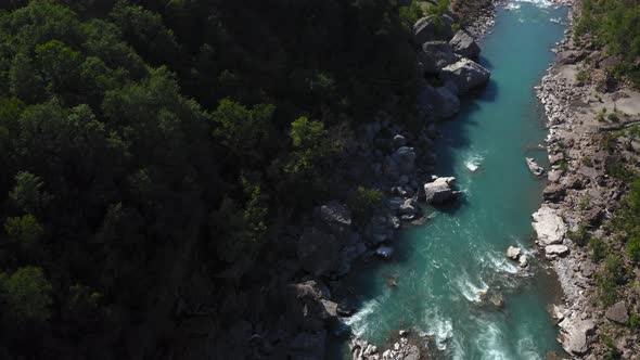 beautiful wild landscape in the Vjosa river canyon, Albania, Europe. Aerial view, tilt up