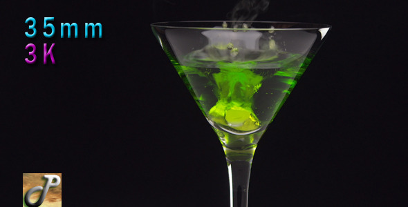 Green Cocktail In Martini Glass With Smoke Effect alt