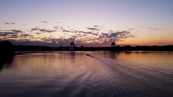 Reflection of an orange sunset in the water