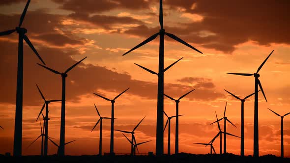 Power Windmills In The California Desert At Sunset