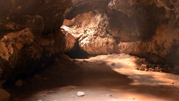 Light Rays Shine Inside Of Lava Tube Cave 2