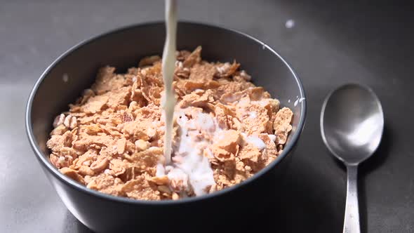 Pouring Cereal Flakes And Milk (2 Of 8)