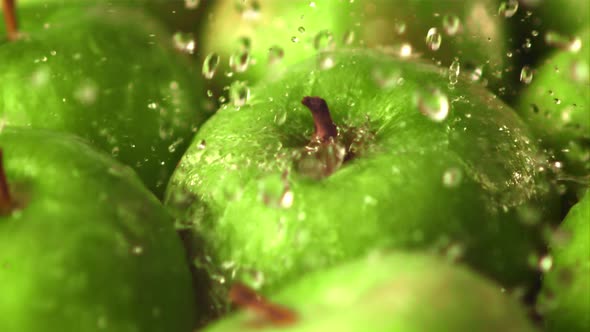 Super Slow Motion Water Droplets Fall on Fresh Apples