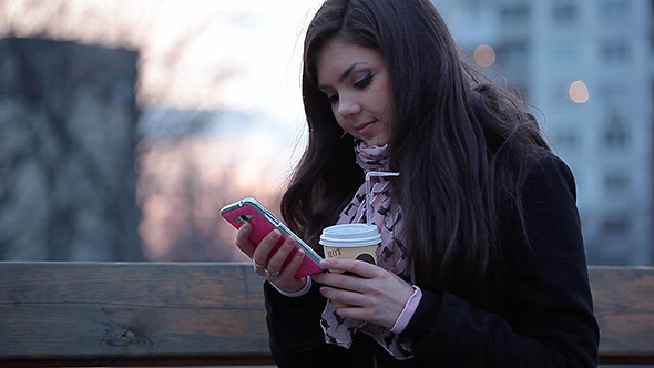 Girl Typing On A Mobile Phone