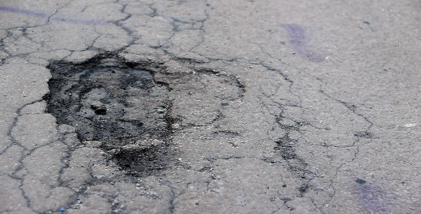Damaged Black Apshalt