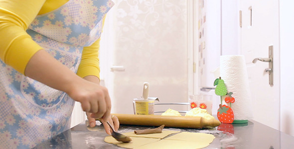 Woman Making Dough in Kitchen 2