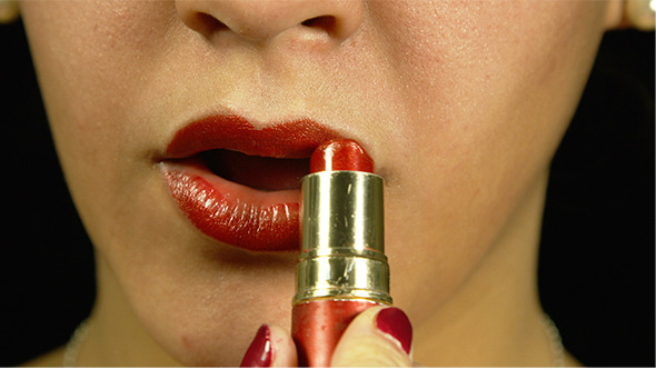 Girl Applying Lipstick alt