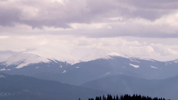 Dark Clouds Moving Fast Over the Slope of Mount