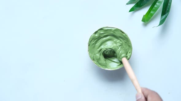 Bubble Clay Mask in Container on White Background