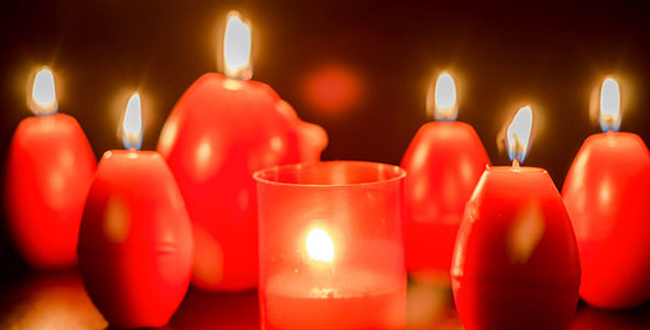 Red Easter Egg Shape Candles Burning