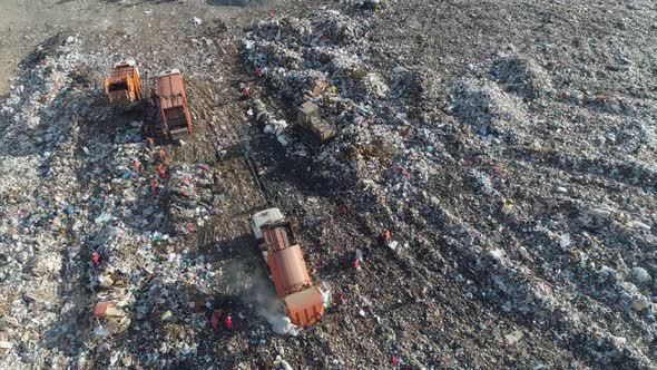 Waste Storage Aerial View of the Garbage Environmental Pollution View From a Height Trucks Unload