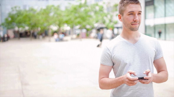 Student Playing with Electronic Device