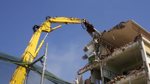 A Crane Breaking Down A Building, Looking A Bit Like Like A Dinosaur Eating! 1