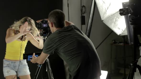 Sexy Cool Blond Woman Dancing In Studio Shoot