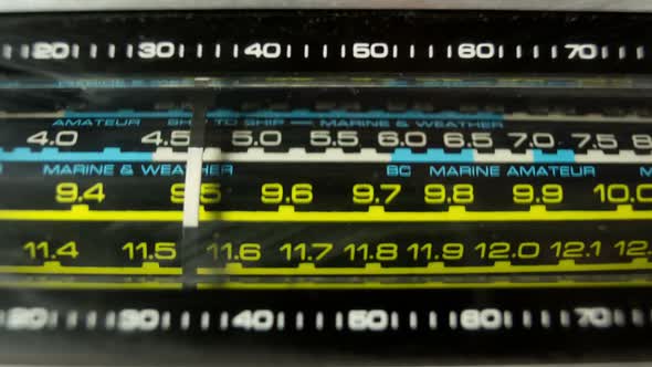 A Vintage Radio Transistor With The Dial Moving Though The Different Stations And Frequencies 3