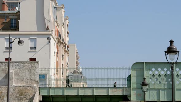 Timelapse Of People Walking Across Footbridge In Paris 1