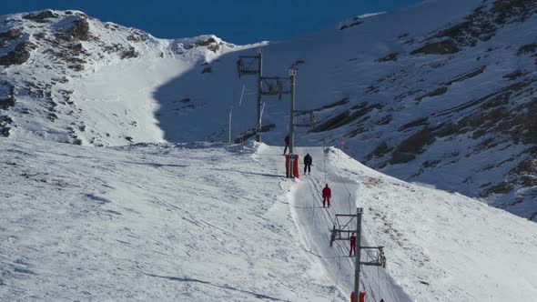 Timelapse Of Skiers And The Chair Lifts In The French Alp Resort Of Le Sauze