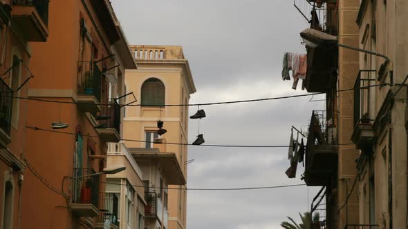 Shoes Hanging From Washing Line In Barcelona