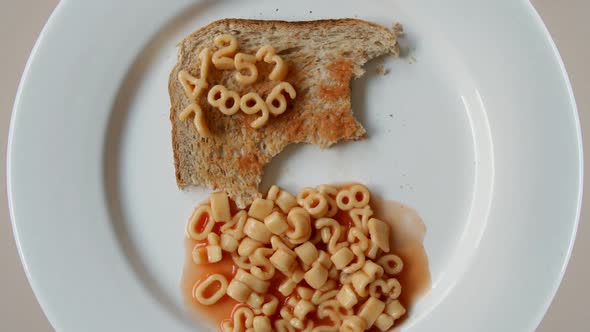 Number Sequence Made From Spaghetti Pasta Letters In Tomato Sauce On Toast 4
