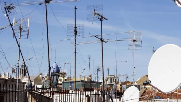 Abstract Pattern Of Tv Aerials And Satellites On Rooftops 1