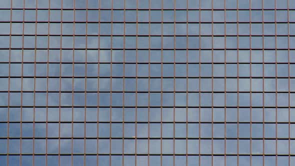 Clouds Reflecting On Office Building Windows - 1