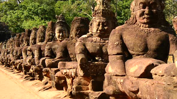 Stone Carving Of Buddha's Gods On Bridge - Angkor Wat, Cambodia 2