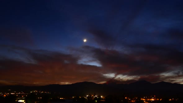 Sunset In The Desert With Moon alt