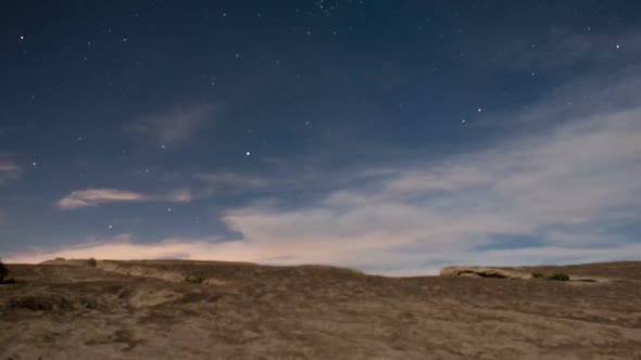 Desert Rocks And Aircraft At Night