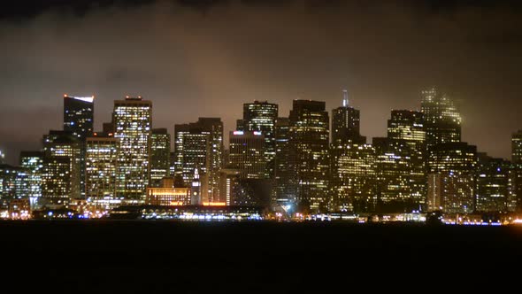 The Foggy San Francisco Skyline At Night 10