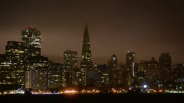 The Foggy San Francisco Skyline At Night 14