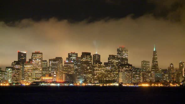 The Foggy San Francisco Skyline At Night 6