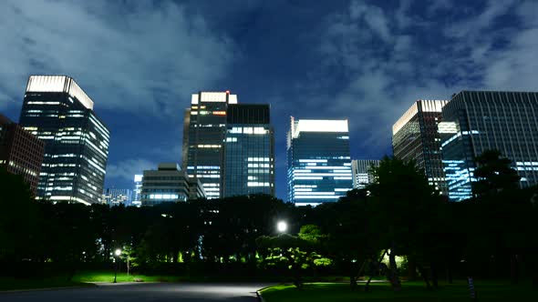 Clouds Passing Downtown Tokyo Skyline At Night From The Royal Garden alt