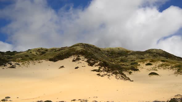 Clouds Passing Over Sand Dune 2