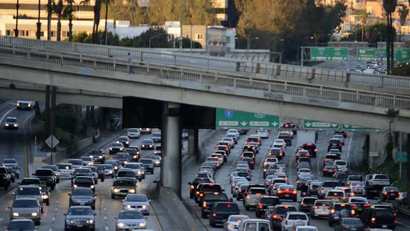 Rush Hour Traffic In Downtown Los Angeles During Sunset 1
