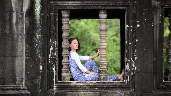 Female Buddhist Meditating In Temple Window - Angkor Wat, Cambodia 1