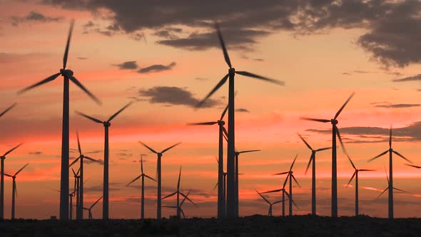 Power Windmills In The California Desert At Sunset 11