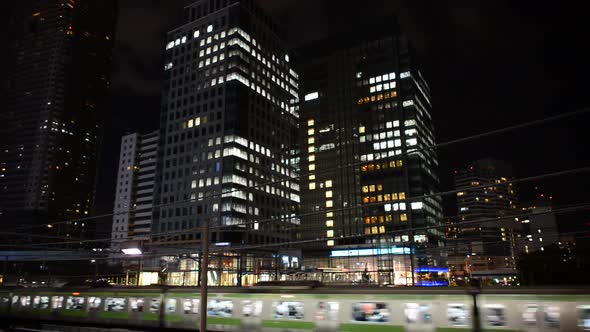 Train Passing Over Bridge In Central Tokyo Japan At Night 2