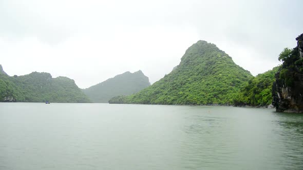 Time Lapse Of Boats Pov On A Rainy Foggy Day In Ha Long Bay Vietnam 6 alt